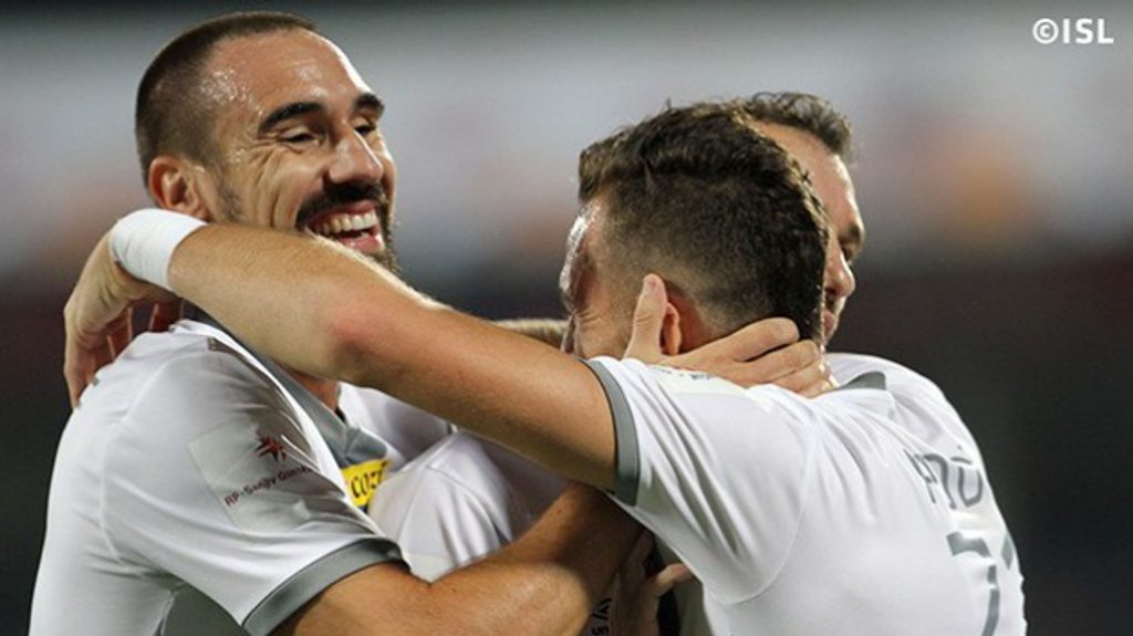 Atletico de Kolkata players celebrate a goal